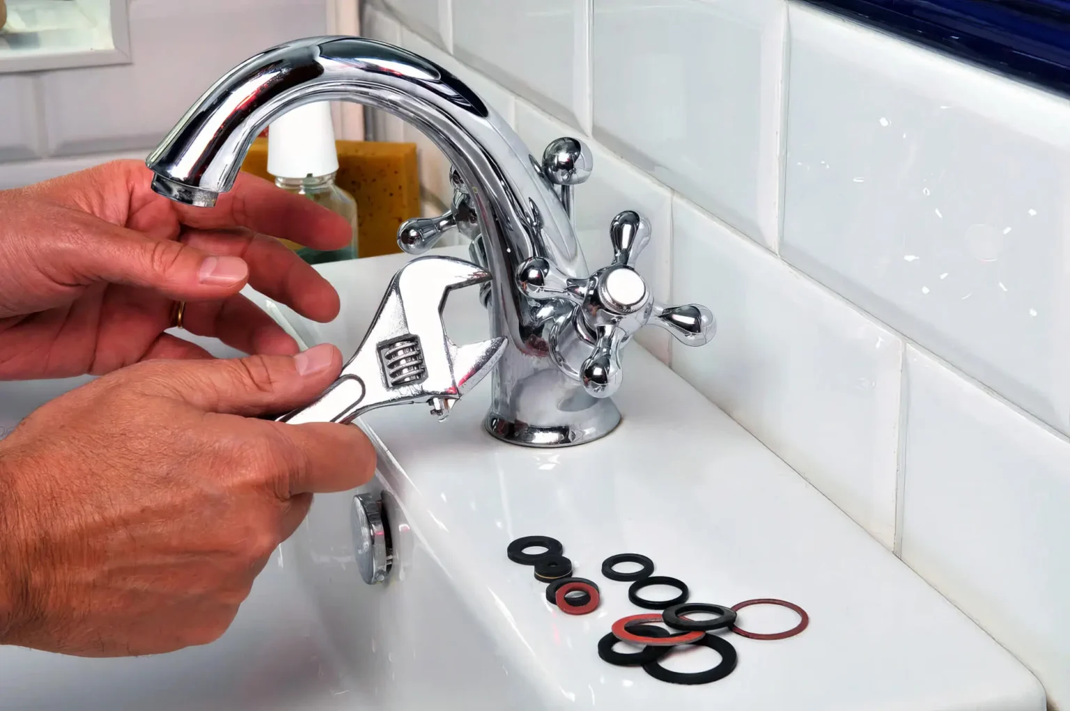 Plumber maintaining a bathroom faucet in Folsom